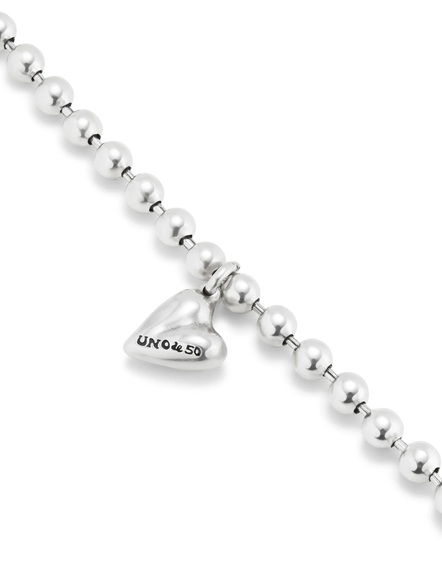 Beaded bracelet with a heart charm-Uno De 50